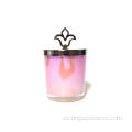 Tarro de vela de vidrio coloreado con tapa de perilla en forma de llama